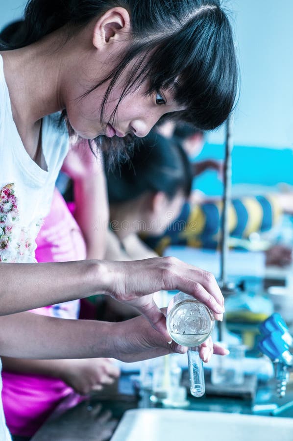 Chemistry experiments editorial image. Image of studying 33227355