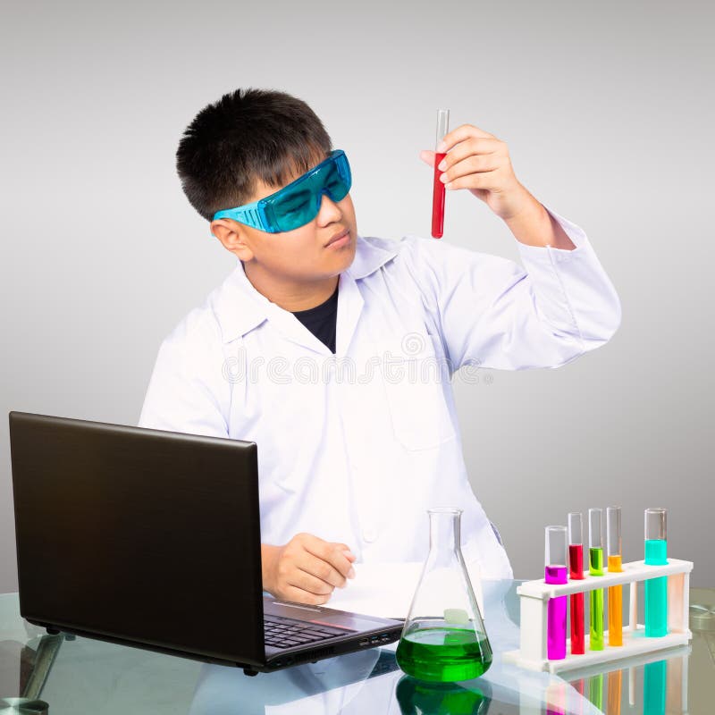 Young asian boy study chemistry, Science and chemistry education concept