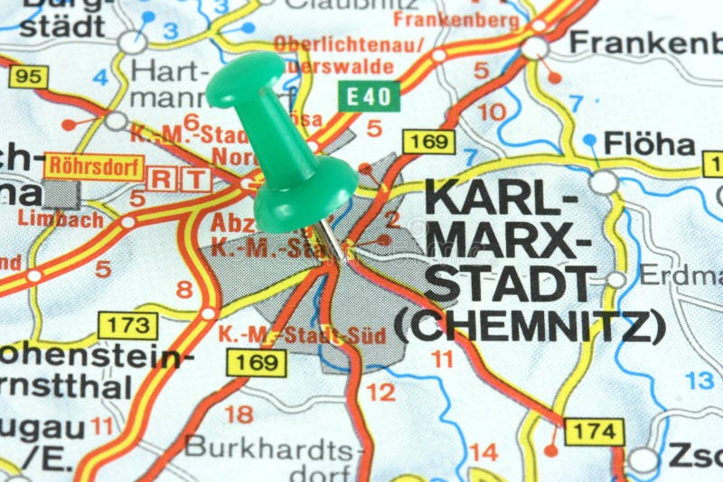 Former Karl Marx Stadt, now Chemnitz in Germany. Push pin on an old map showing travel destination.