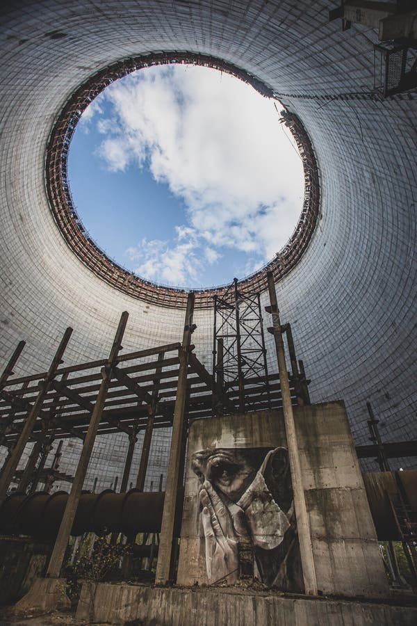 Futuristic view inside of cooling tower of unfinished Chernobyl nuclear power plant. Catastrophe, industry.