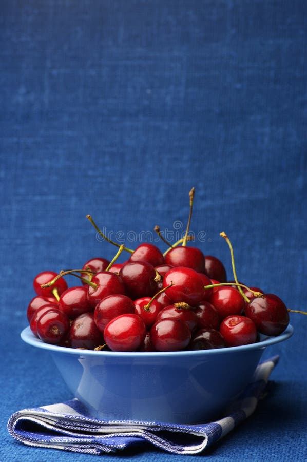 Cherries in bowl stock image. Image of food, blue, berry 15092143