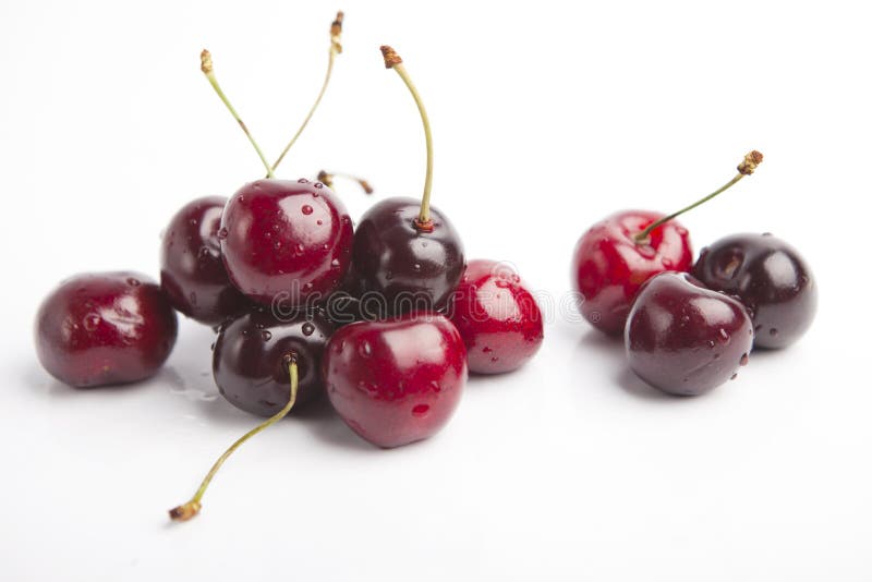 Cherries on white background