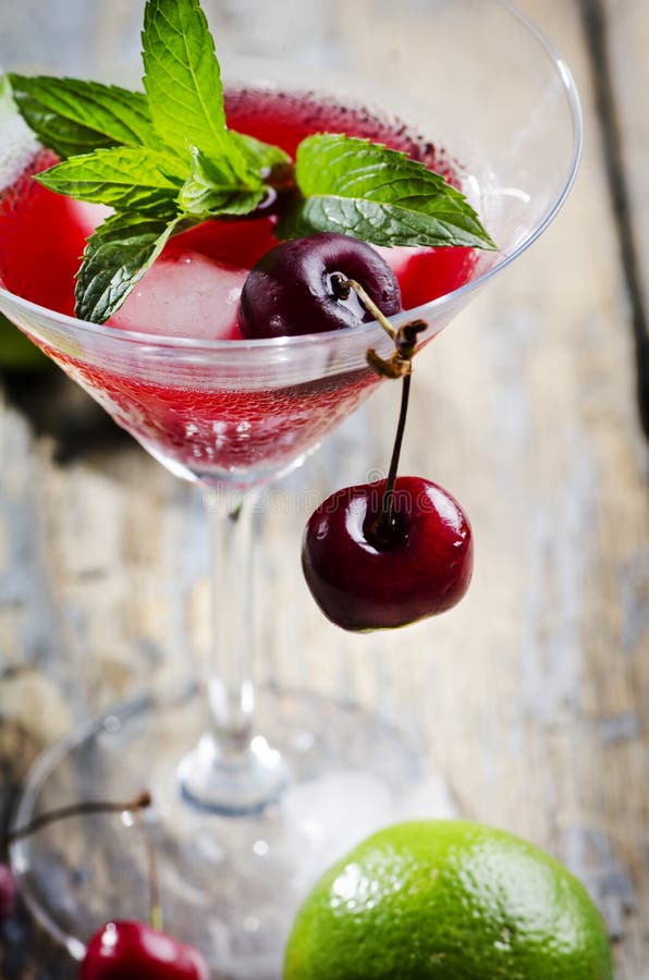 Red Cherry Cocktail With Mint Top View Isolated On White Background