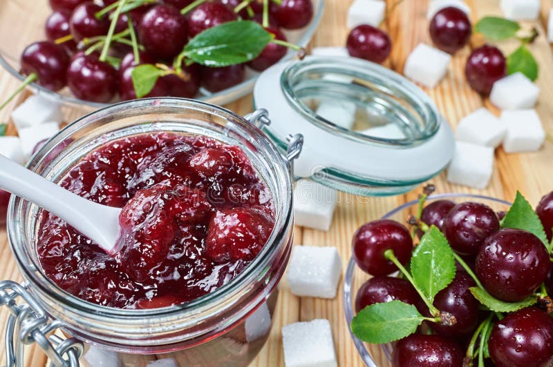 Cherry jam in a jar stock photo. Image of breakfast, cook 89025836