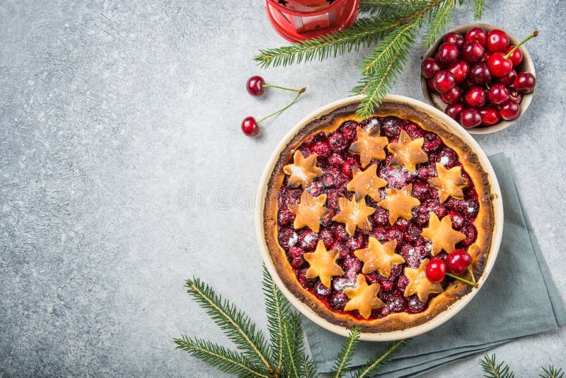 Cherry piecake with fresh cherry. Christmas decotation stock images