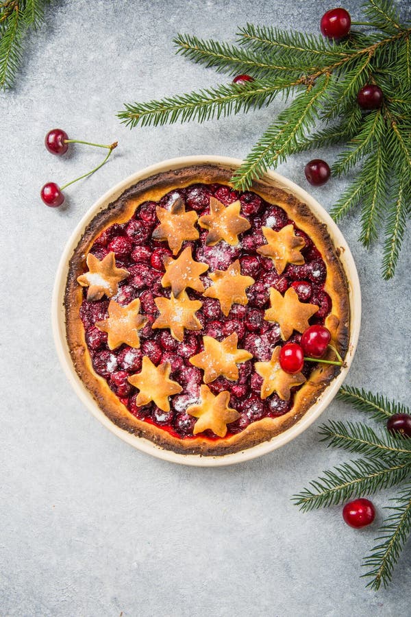 Cherry piecake with fresh cherry. Christmas decotation stock photography