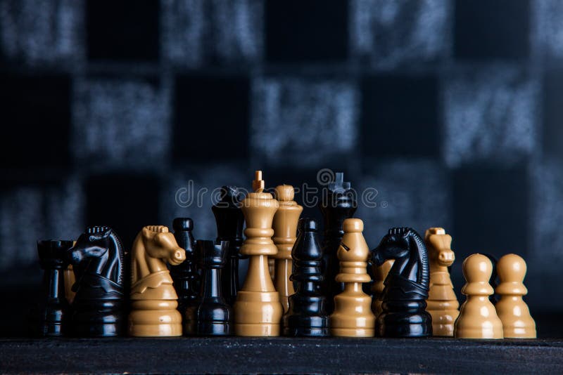 Chess board with chess pieces. Chess on the dark background. Business success concept. Strategy. Checkmate. Chess board with chess pieces. Chess on the dark royalty free stock photo Chess board with chess pieces. Chess on the dark background. Business success concept. Strategy. Checkmate. Chess board with chess pieces. Chess on the dark royalty free stock photo