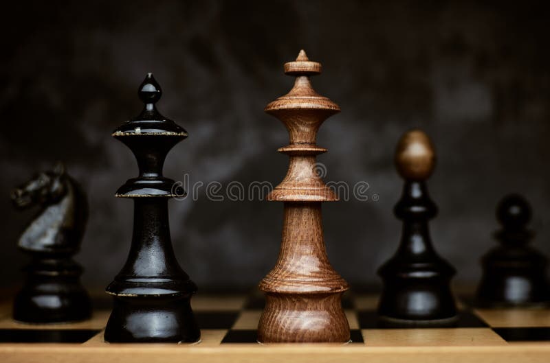 Chess Game with King Checkmate by Queen Stock Photo - Image of