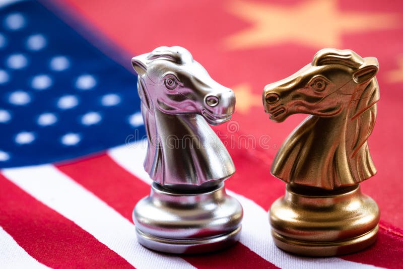 Chess game, two knights face to face on China and US national flags. Trade war concept. Conflict between two big countries, USA stock photos Chess game, two knights face to face on China and US national flags. Trade war concept. Conflict between two big countries, USA stock photos
