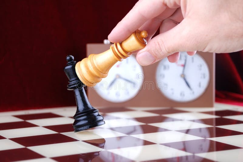 A Check Mate From A Chess King To Another On A Checkboard Stock Photo,  Picture and Royalty Free Image. Image 6730739.