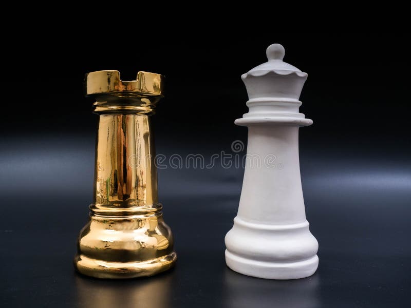 Chess leadership concept with gold and white chess isolated in black background. Chess concept save the strategy royalty free stock photos Chess leadership concept with gold and white chess isolated in black background. Chess concept save the strategy royalty free stock photos