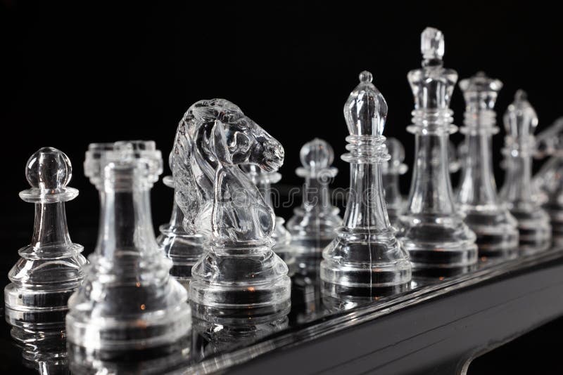 Chess Pieces Placed on a Black Background Stock Image - Image of knight ...
