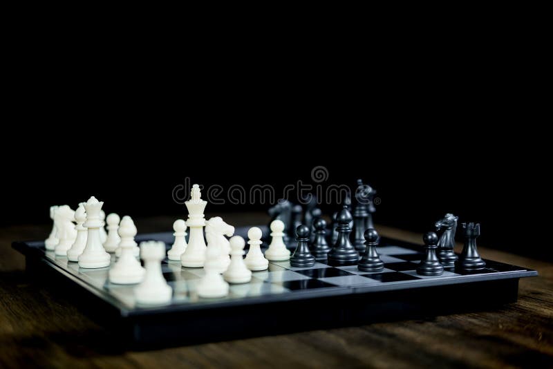 Chess set on the chess board of business ideas and competition and stratagy plan success meaning