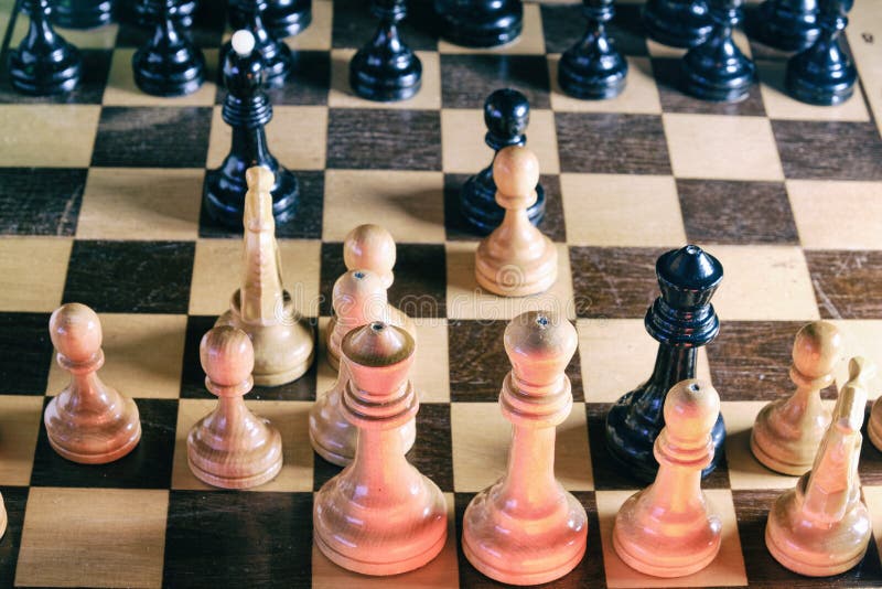 Chessboard with the Queen Gambit Opening and a Clock Showing the Time of  the Game Stock Image - Image of organized, checkered: 235866331