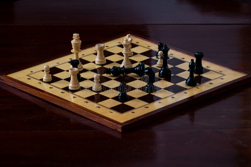 Detailed chessboard with chess during a check mate Stock Photo