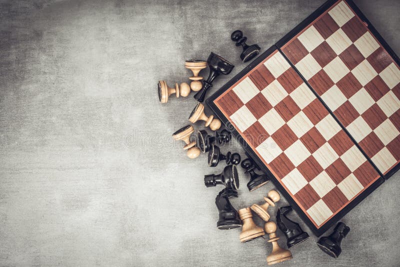 Chess Board With A Few Pieces Scattered On The Floor Background