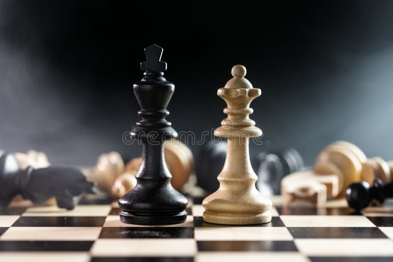 Chess Queen Beats King Between Other Pieces On The Chessboard