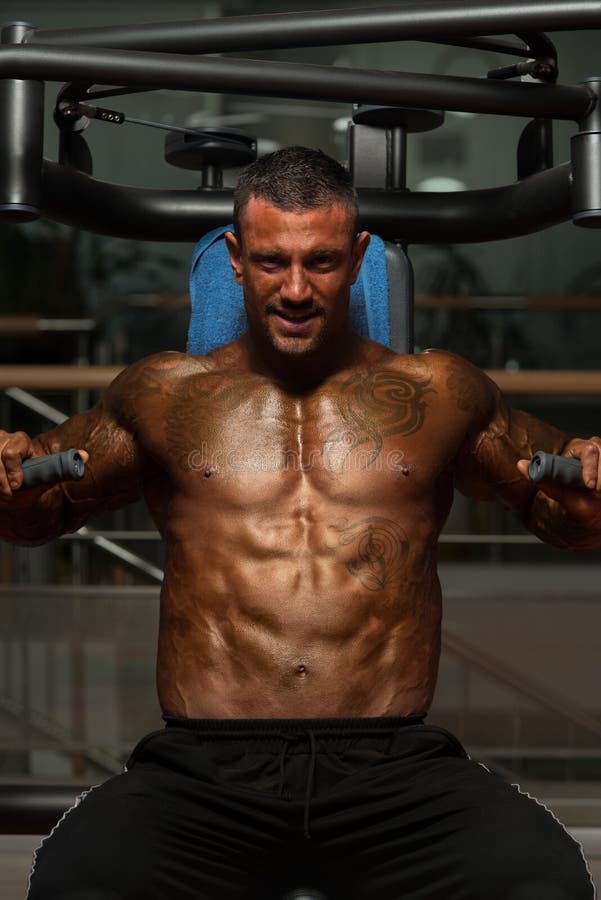 Chest Exercises on a Machine Stock Photo Image of caucasian