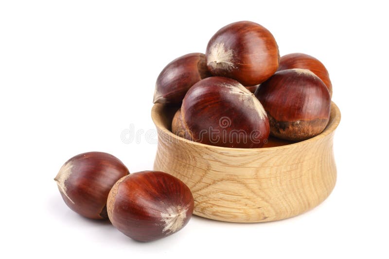 Chestnut in a wooden bowl isolated on white background. Top view