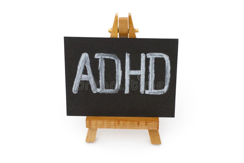 Chevalet en bois avec le tableau noir avec les lettres ADHD photographie stock Chevalet en bois avec le tableau noir avec les lettres ADHD photographie stock