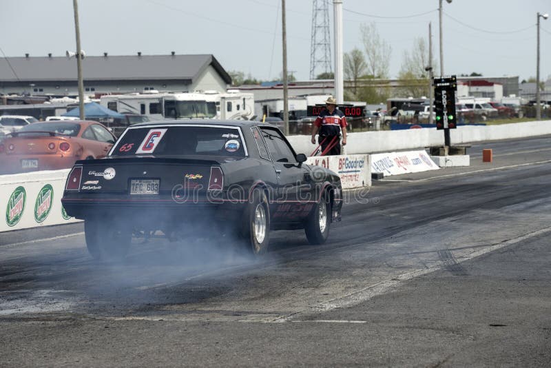 Chevrolet drag car burnout stock photo