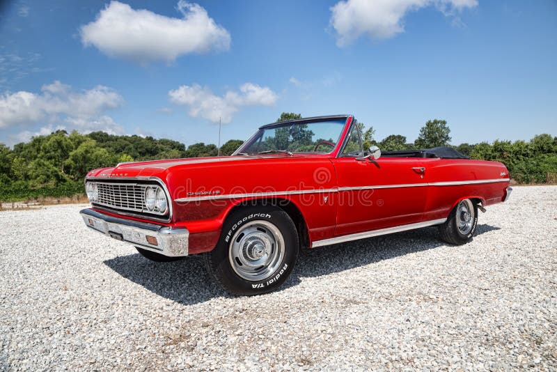 A red 1964 Chevrolet Malibu convertible