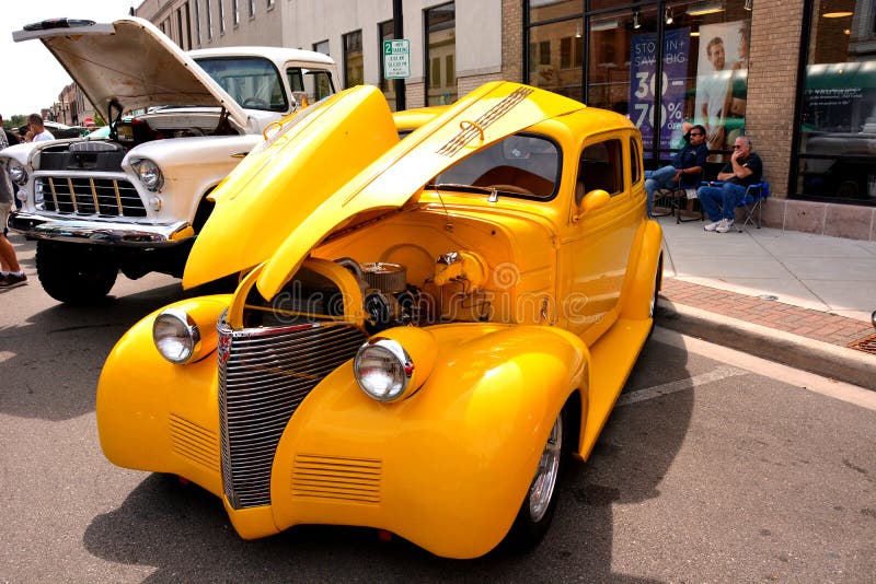 Kenosha, Wisconsin / USA - August 31, 2019:  A bright yellow 1939 Chevrolet Master Deluxe on display at the annual downtown Kenosha car show. Kenosha, Wisconsin / USA - August 31, 2019:  A bright yellow 1939 Chevrolet Master Deluxe on display at the annual downtown Kenosha car show.