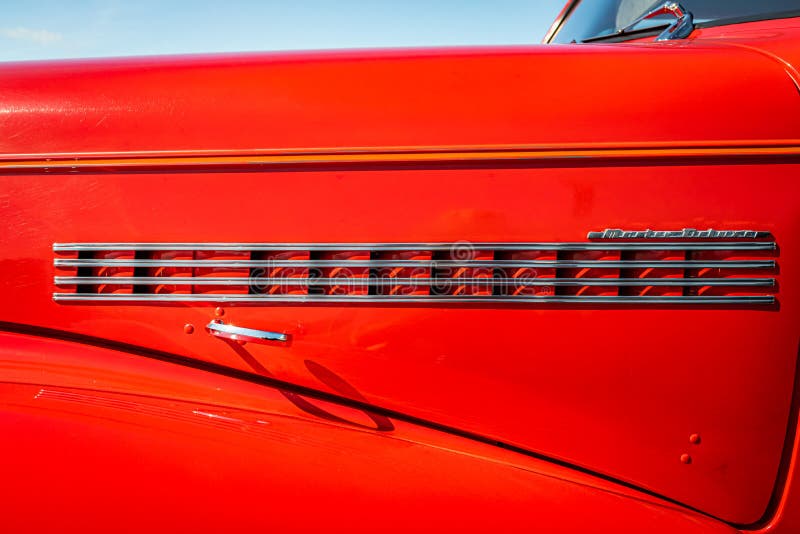 Lebanon, TN - May 13, 2022: Wide angle low perspective view of the side fender of a 1939 Chevrolet Master Deluxe Town Sedan at a local car show