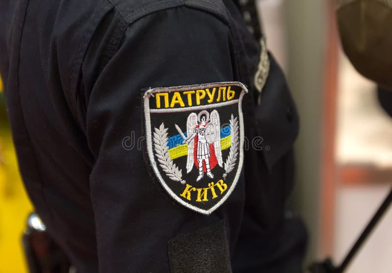 Chevron in the form of Ukrainian patrol officer with the inscription Patrol. Kiev royalty free stock photography