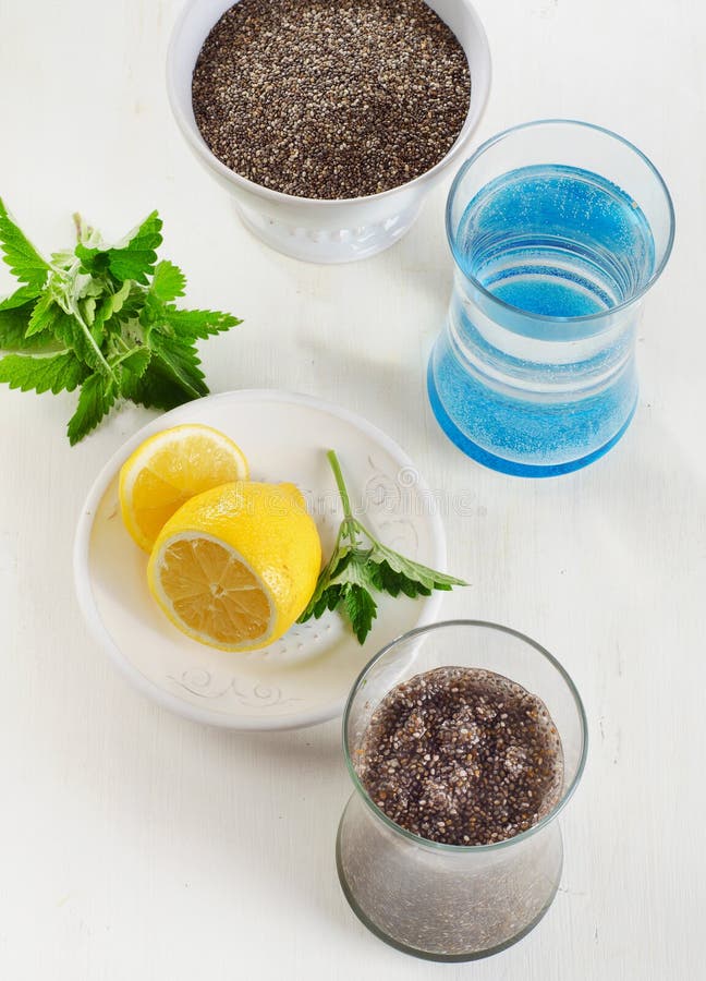 Chia Seeds Drink with a Water, Mint and Lemon in Glass. Stock Photo