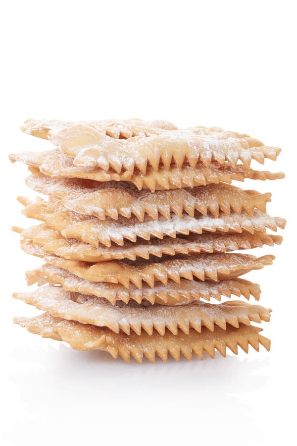 Chiacchiere, tas italien de pâtisserie photographie stock libre de droits Chiacchiere, tas italien de pâtisserie photographie stock libre de droits