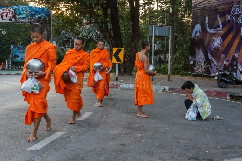 Monks collect donations in Chiang Mai, Thailand royalty free stock photo Monks collect donations in Chiang Mai, Thailand royalty free stock photo