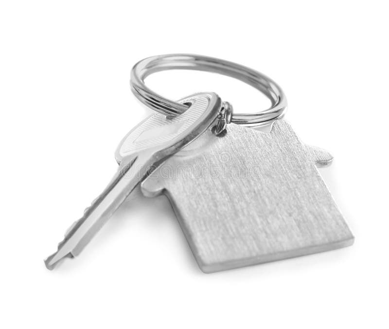 Chiave con il ninnolo su fondo bianco Mediatore di assicurazione fotografie stock libere da diritti Chiave con il ninnolo su fondo bianco Mediatore di assicurazione fotografie stock libere da diritti