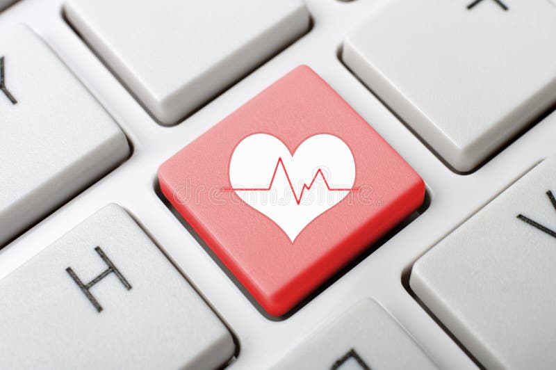 Tasto del battito cardiaco sulla tastiera immagini stock