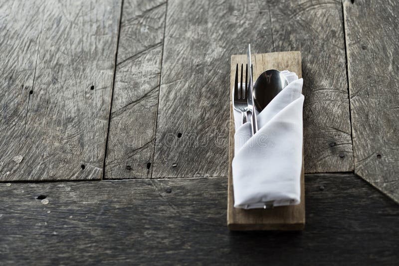 Chic Cutlery on Old Rustic Wooden Restaurant Table Stock Photo Image