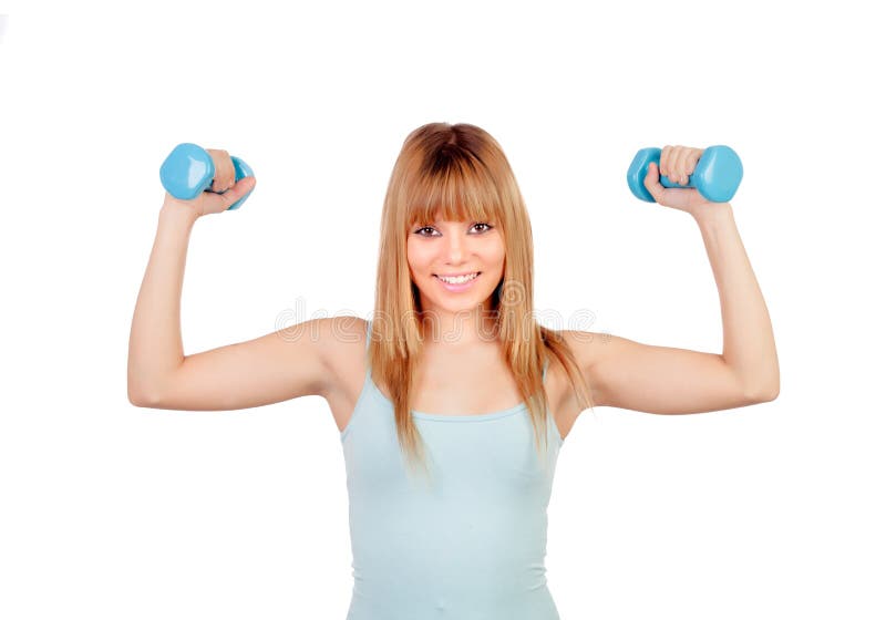 Chica joven atractiva con pesas de gimnasia imagen de archivo libre de regalías Chica joven atractiva con pesas de gimnasia imagen de archivo libre de regalías