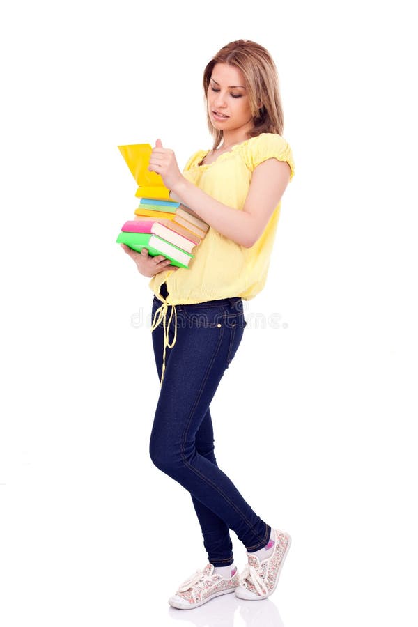 Attractive girl with books in hands, isolated on white background. Attractive girl with books in hands, isolated on white background