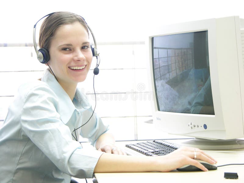 Chica joven que disfruta de su trabajo fotografía de archivo