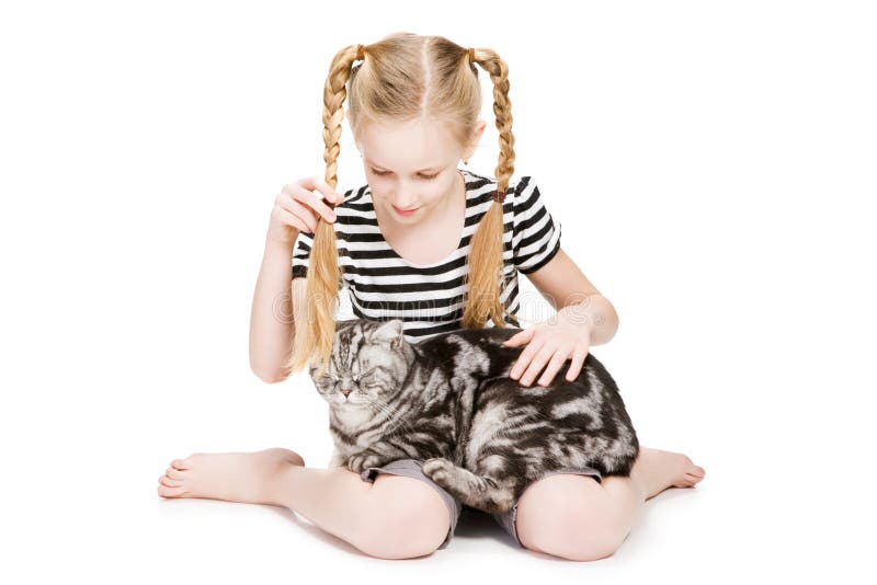 Young girl posing with cat, isilated on white. Young girl posing with cat, isilated on white