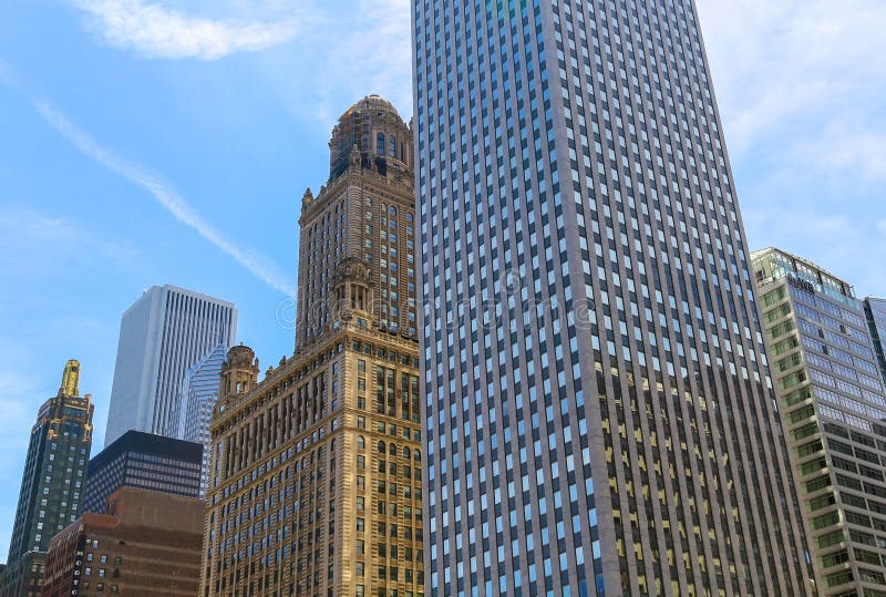 Chicago, USA - May 24, 2014: Facades of several skyscrapers in Downtown with different architectural styles. Chicago, USA - May 24, 2014: Facades of several skyscrapers in Downtown with different architectural styles.