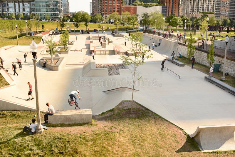 CHICAGO, ILLINOIS - AUGUST 22, 2015: Grant Park Skate Park. The park was opened in 2014 in the South Loop between E. 11th St and S. Michigan Ave. CHICAGO, ILLINOIS - AUGUST 22, 2015: Grant Park Skate Park. The park was opened in 2014 in the South Loop between E. 11th St and S. Michigan Ave.