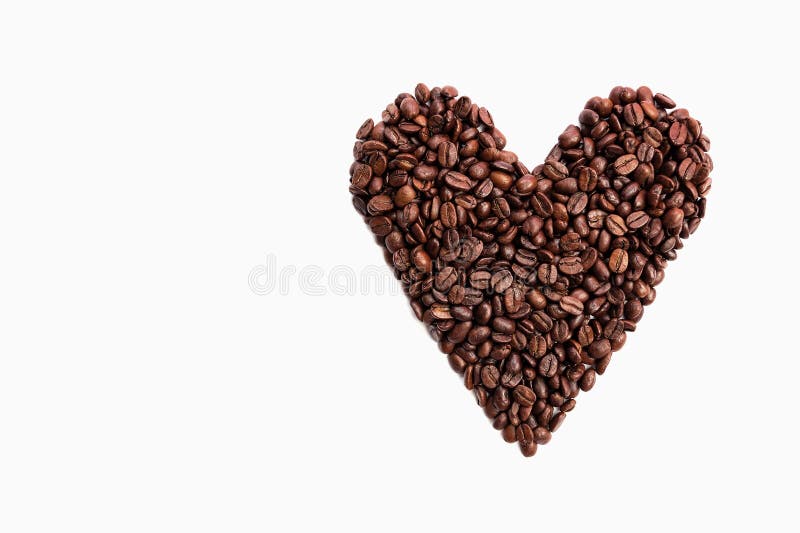 Chicchi di caff? di forma del cuore fotografia stock libera da diritti Chicchi di caff? di forma del cuore fotografia stock libera da diritti
