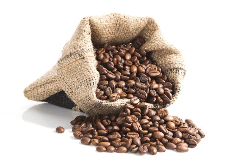 Chicchi di caffè in borsa marrone. immagini stock libere da diritti Chicchi di caffè in borsa marrone. immagini stock libere da diritti