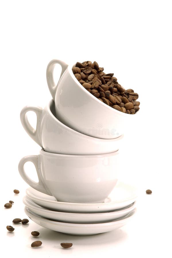 Chicchi e tazze di caffè fotografie stock Chicchi e tazze di caffè fotografie stock