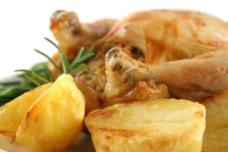 Chicken and Baked Potatoes stock photo. Image of baked 5328402
