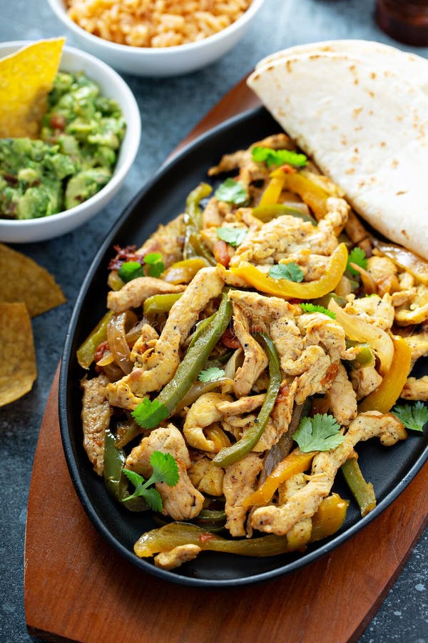 Chicken and Bell Peppers Fajitas Stock Photo - Image of chips, lunch ...