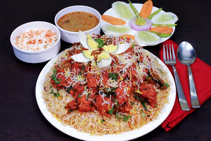 Chicken Biryani is a delicious savory rice dish that is loaded with spicy marinated chicken, caramelized onions, and flavorful saffron rice. Chicken dum biryani stock images, royalty-free photos and pictures