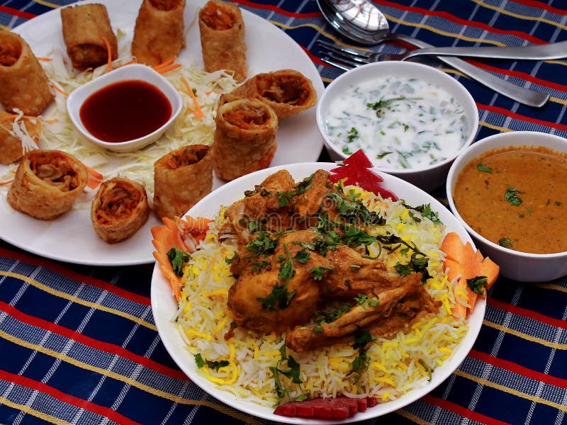 Chicken Biryani is a delicious savory rice dish that is loaded with spicy marinated chicken, caramelized onions, and flavorful saffron rice. a cylindrical casing of rice paper, or sometimes wheat-and-egg dough, filled with a shredded mixture of vegetables and often meat or seafood, served fresh or deep-fried. Chicken dum biryani stock images, royalty-free photos and pictures