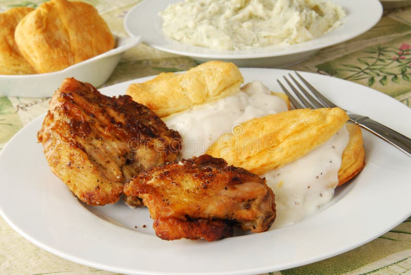 Chicken and Biscuits with Gravy Stock Image Image of table, biscuits