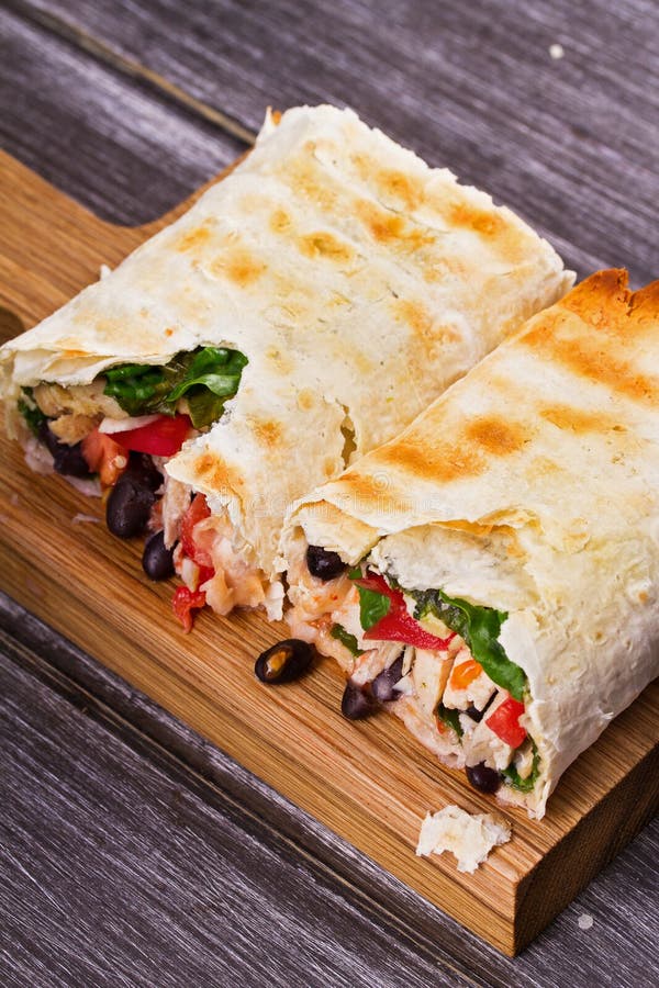 Chicken, Black Beans, Spinach and Tomato Burritos. Stock Image Image
